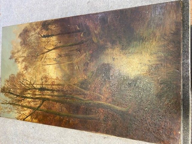 A landscape painting with trees and a light-filled opening.