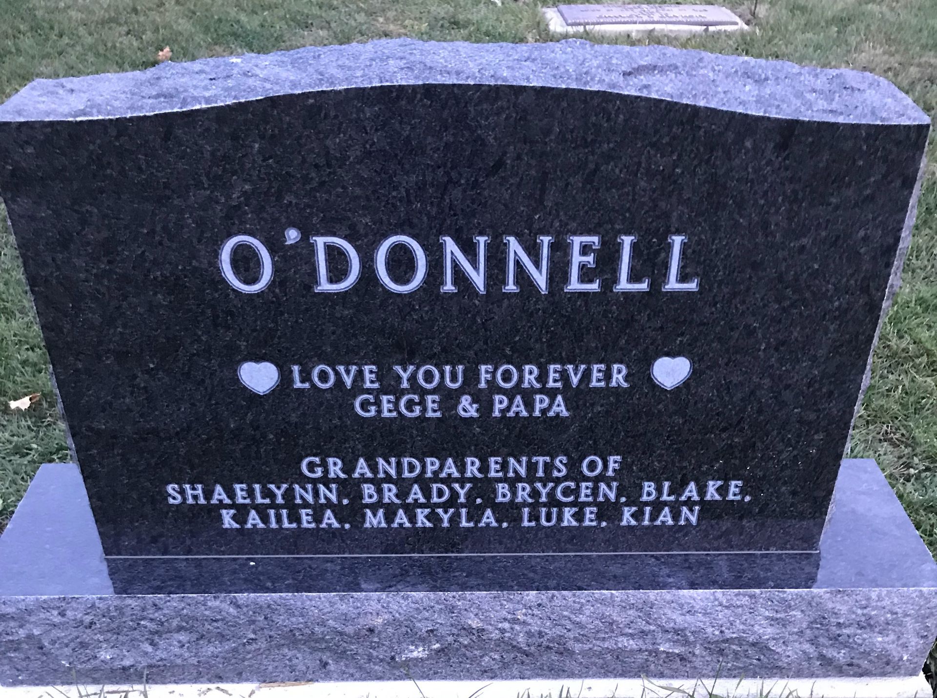 A gravestone with the name O'Donnell on it