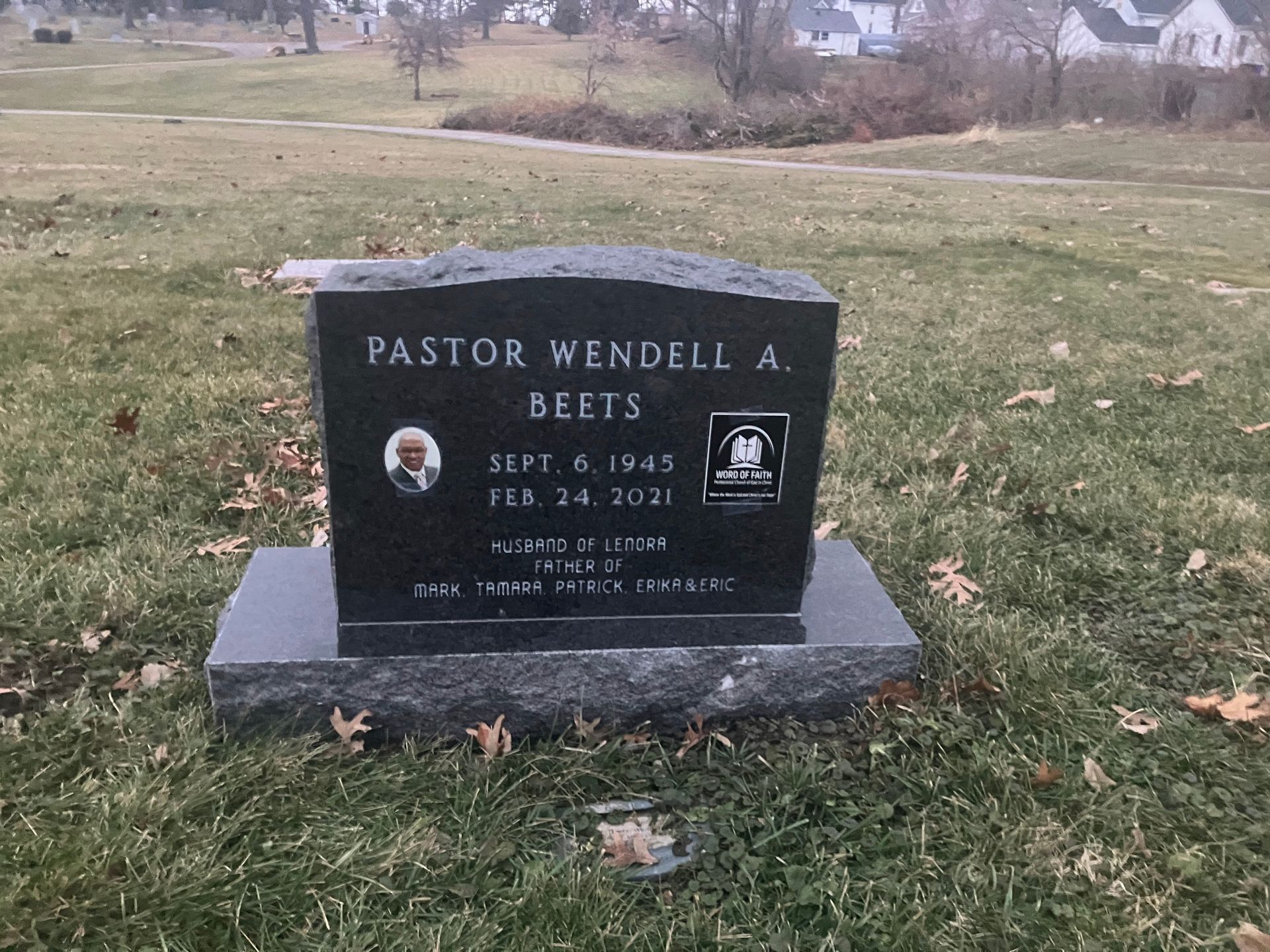 A gravestone for Pastor Wendell A. Beets is in a cemetery