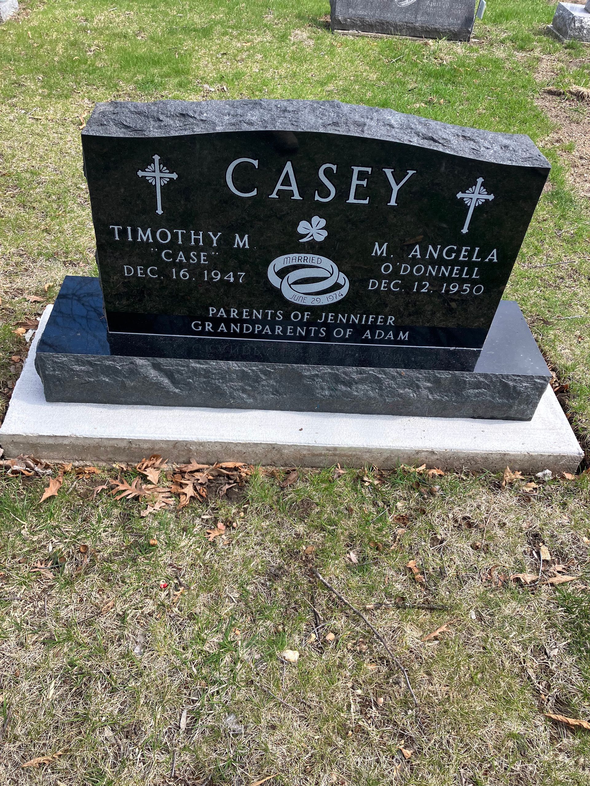 A gravestone for Casey is in a cemetery