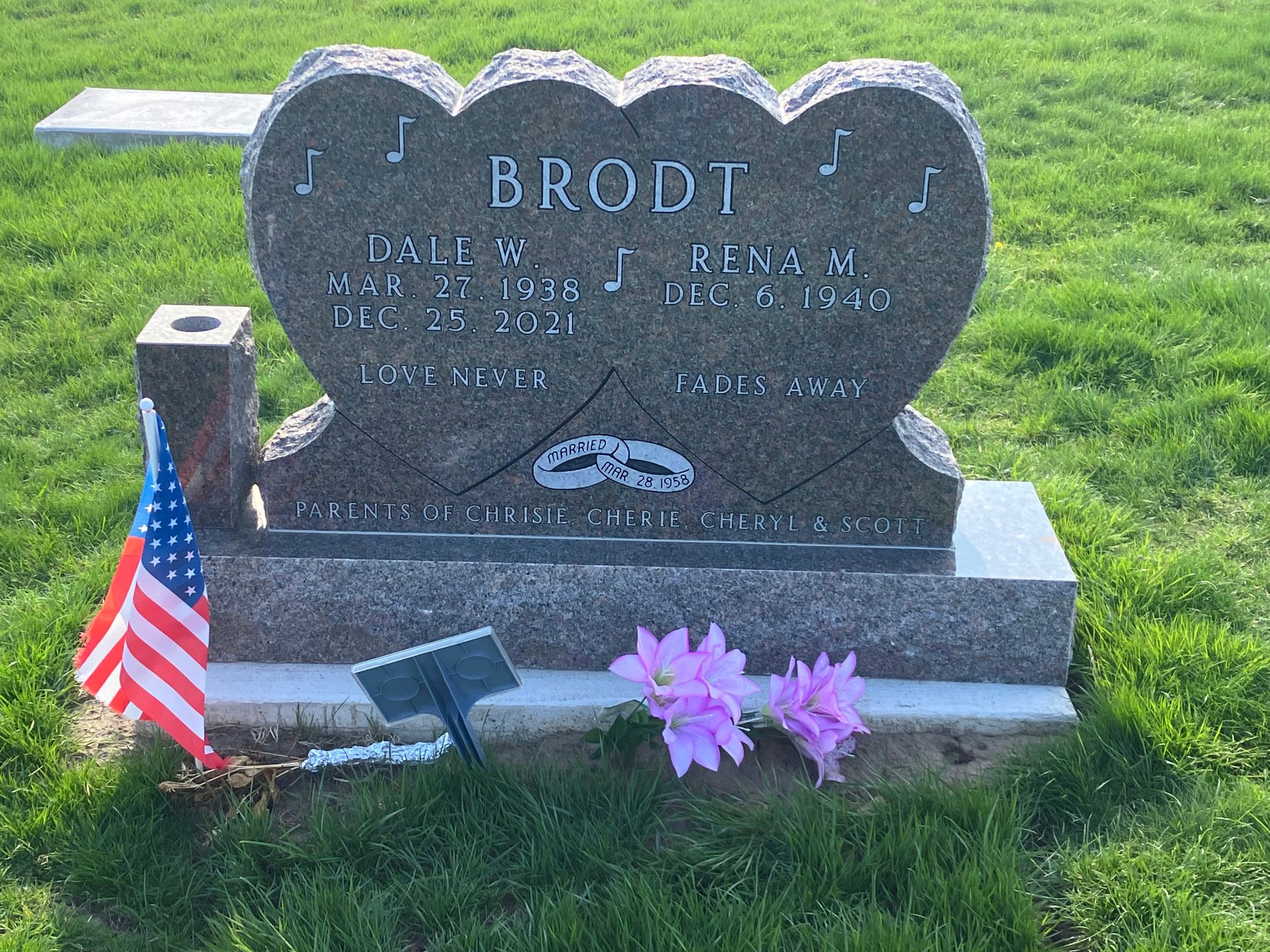 A heart shaped gravestone with the name brodt on it