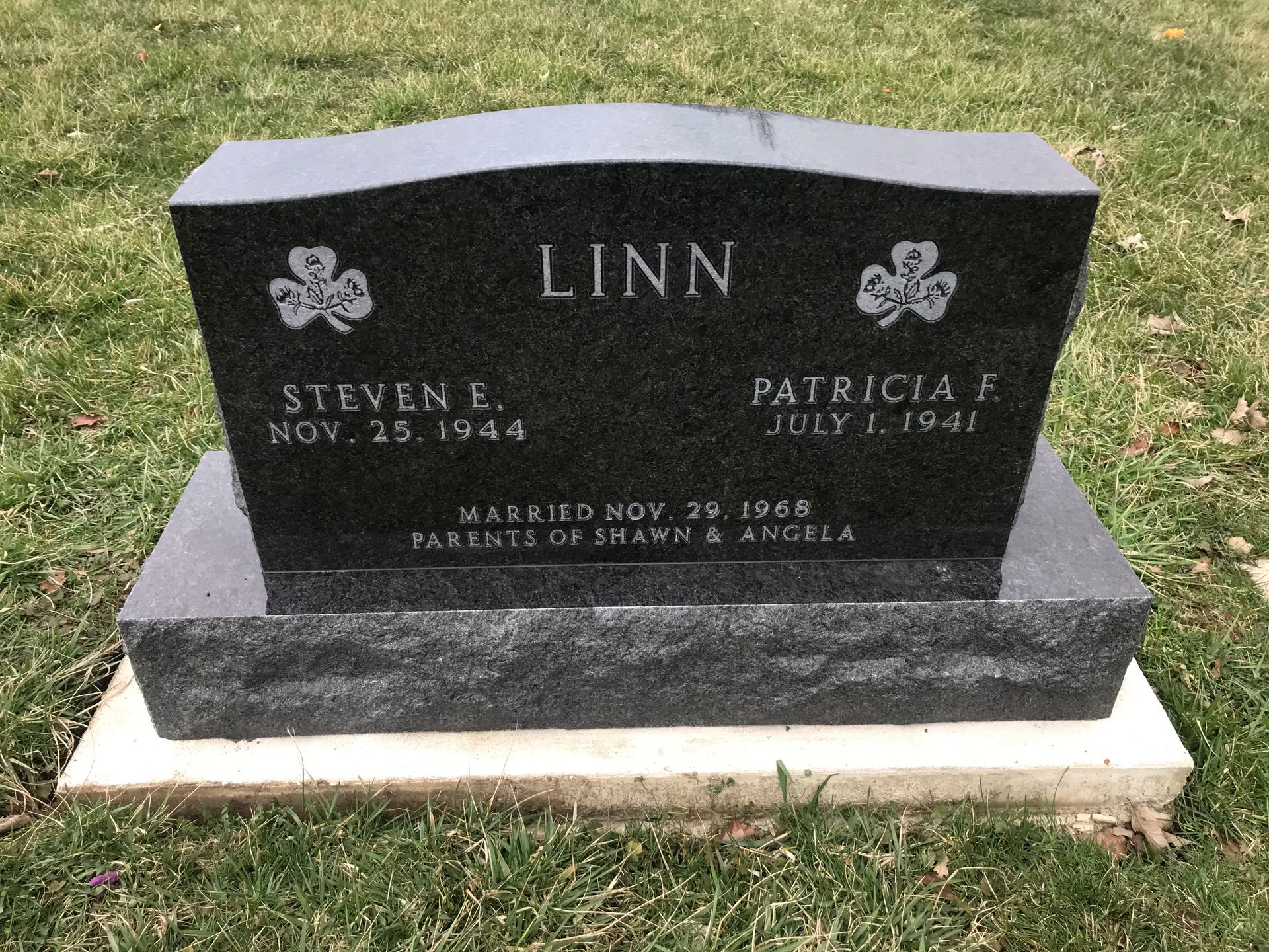 A gravestone for Steven and Patricia Linn in a cemetery