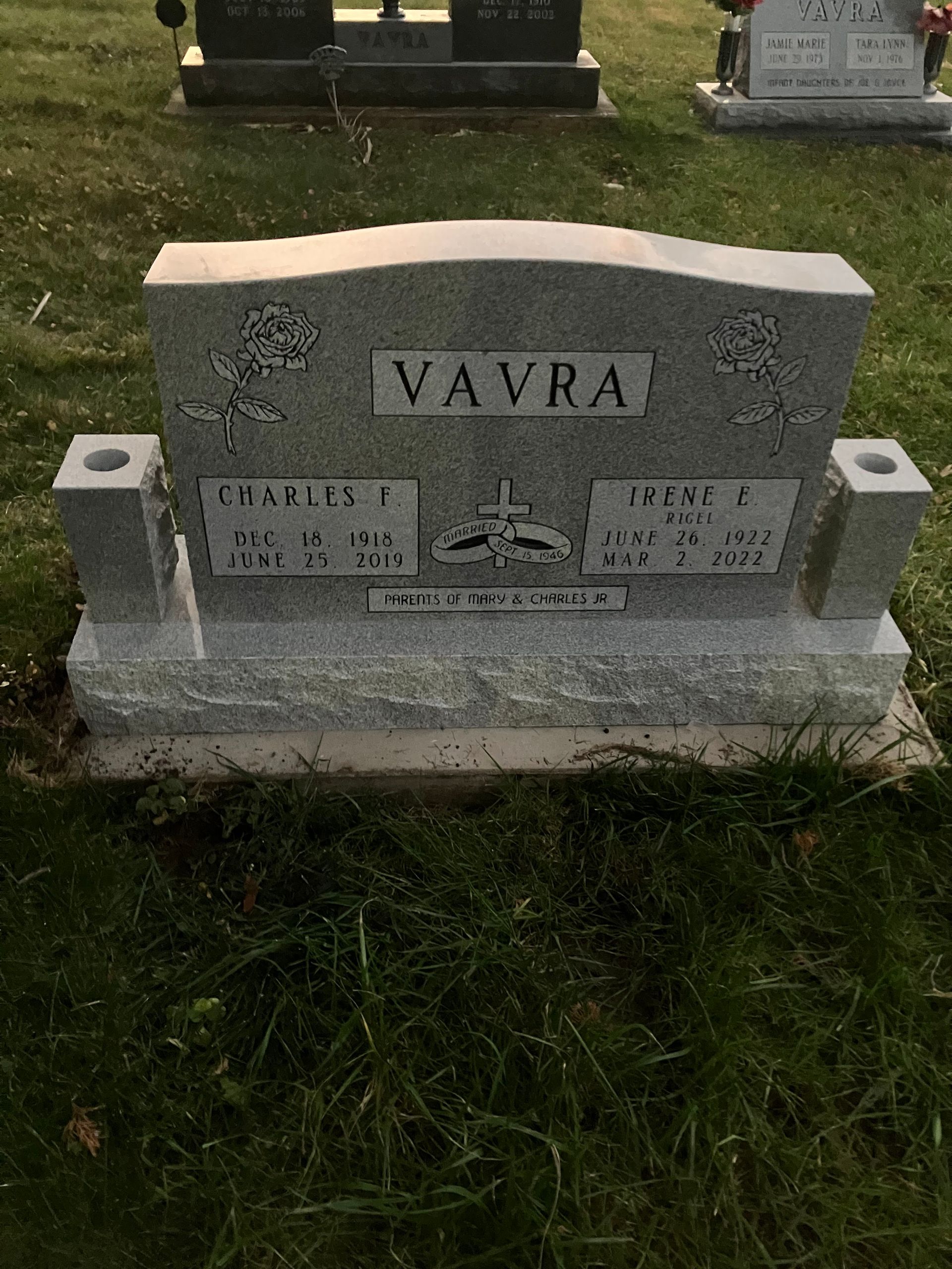 A gravestone in a cemetery with the name Vavra on it