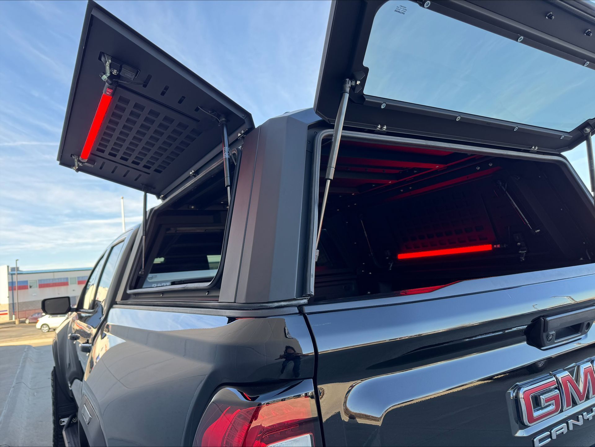 Black GMC pickup.