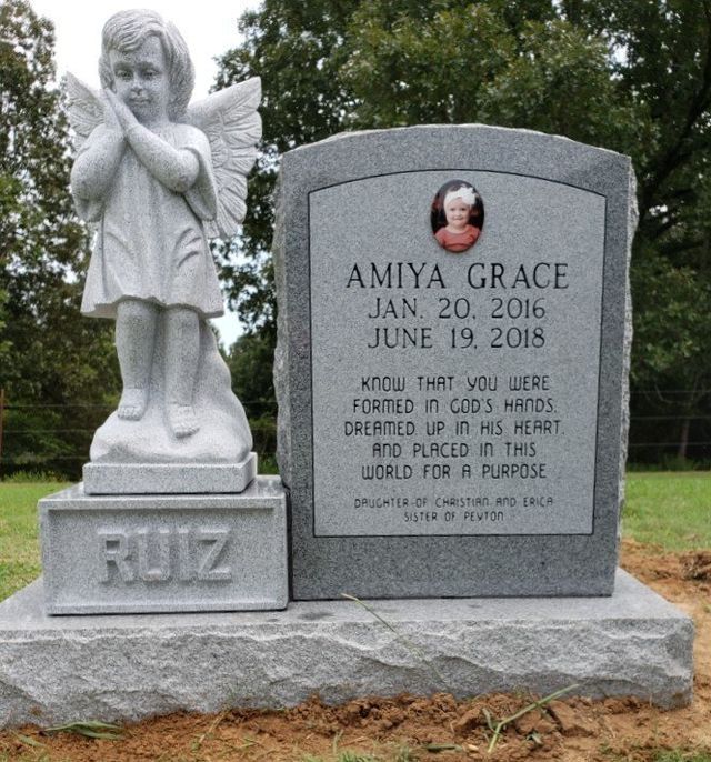Single Monument With Granite Angel on Pedestal