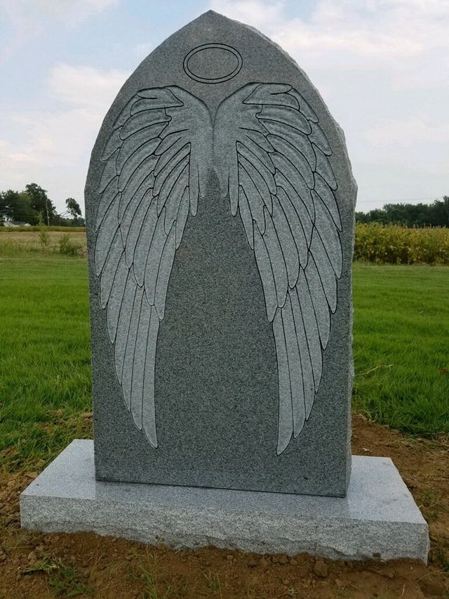 Gothic Top Monument with Carved Angel Wings on Back