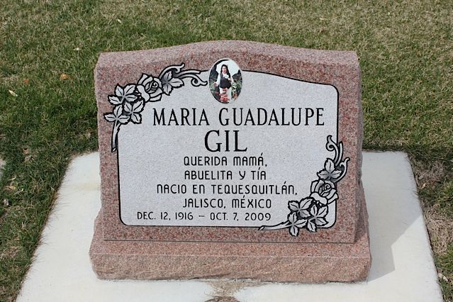 Tombstone of Maria Guadalupe Gil, with photo, birth/death dates, and