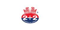 Red and blue 2+2 logo with a checkered crown on top and small text below