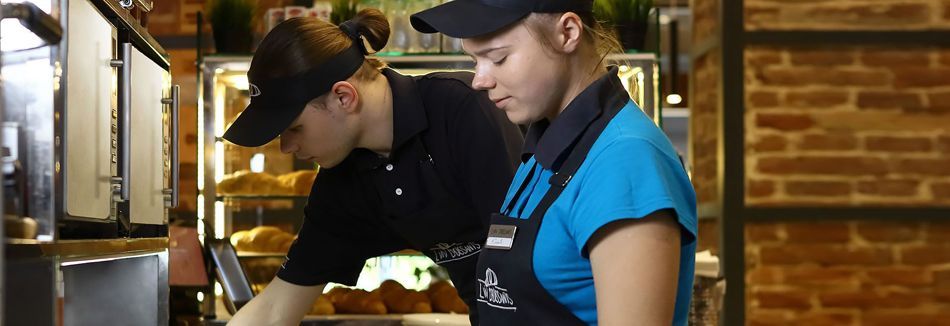 A woman are working in a restaurant.