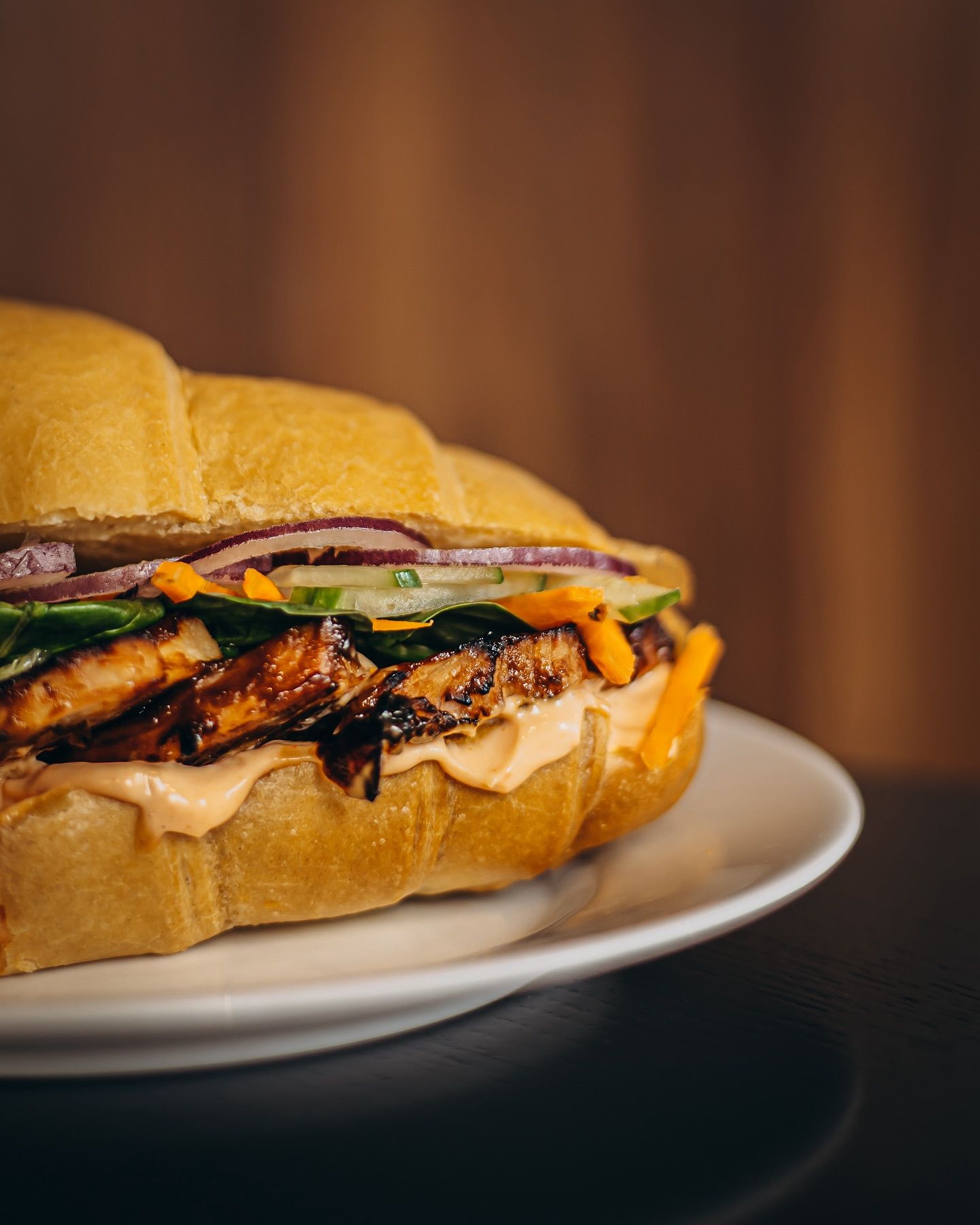 A close up of a sandwich on a plate.