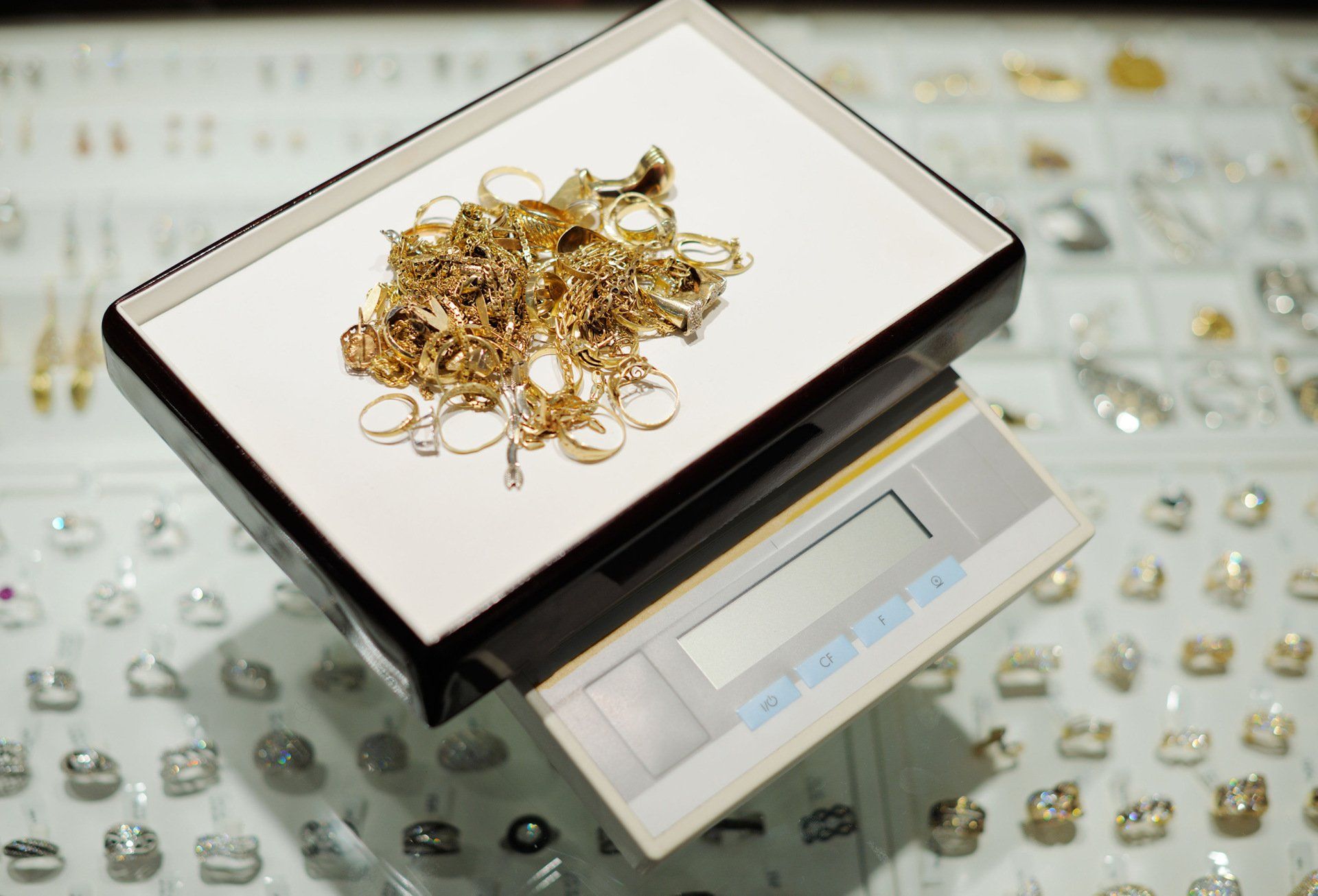 Gold being weighted