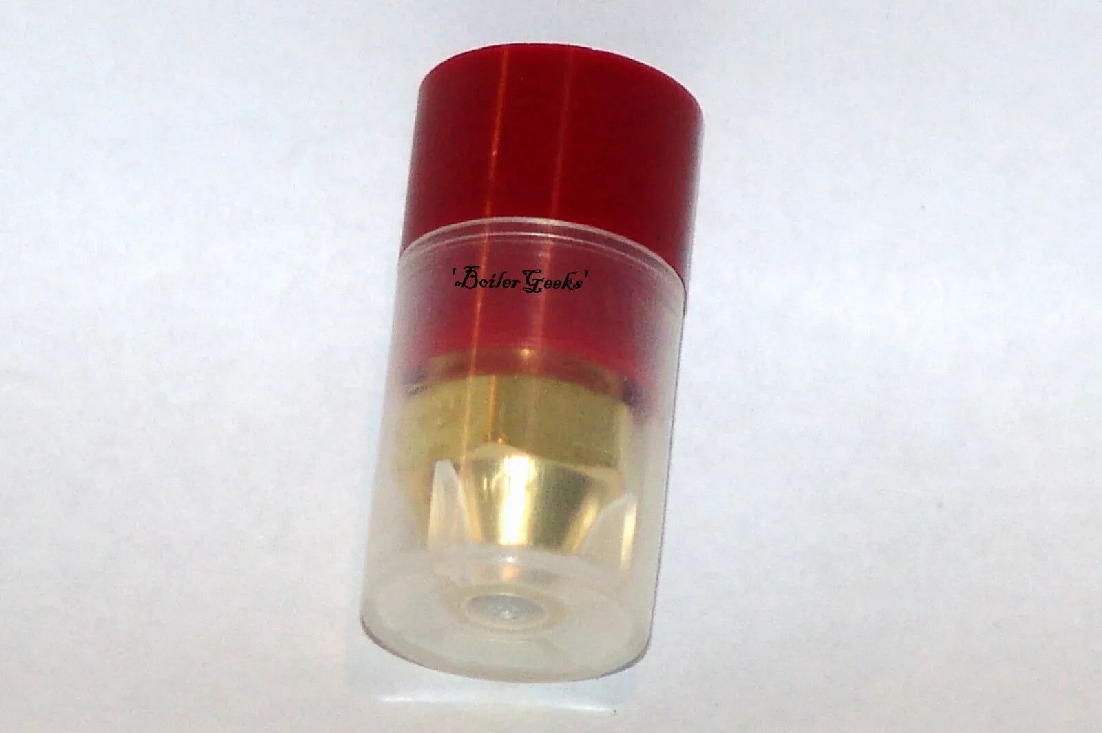 Red and gold aerosol can with a clear plastic bottom section, against a white backdrop.