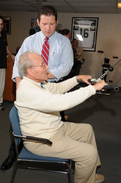 Senior on pulley exercises