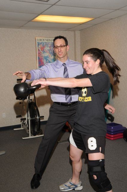 Teen lifting weights