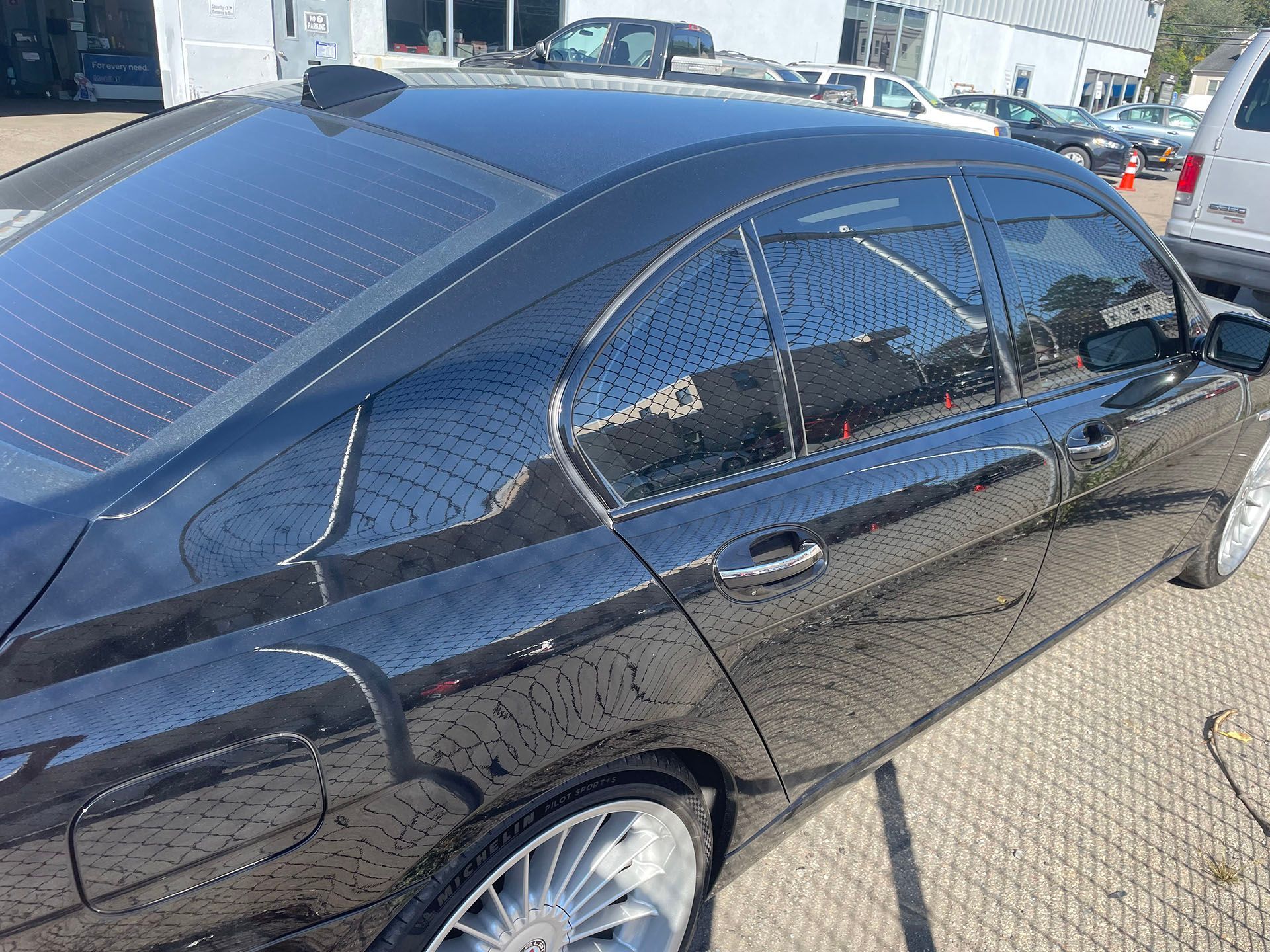 Window tinting on black car