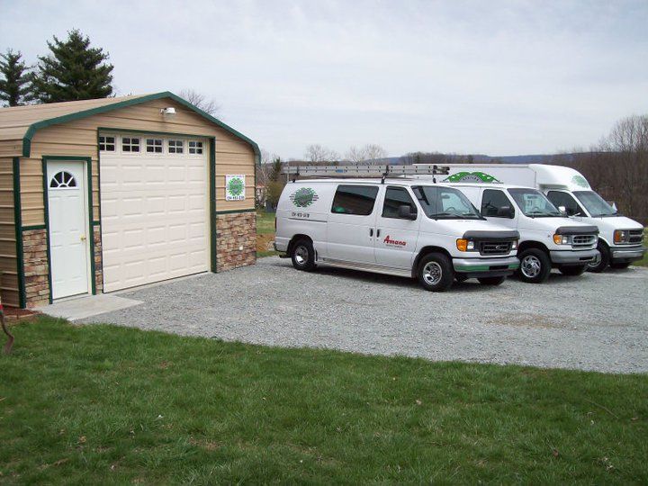 Building and the three trucks