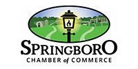 Springboro Chamber of Commerce logo with a lamp post over green landscape