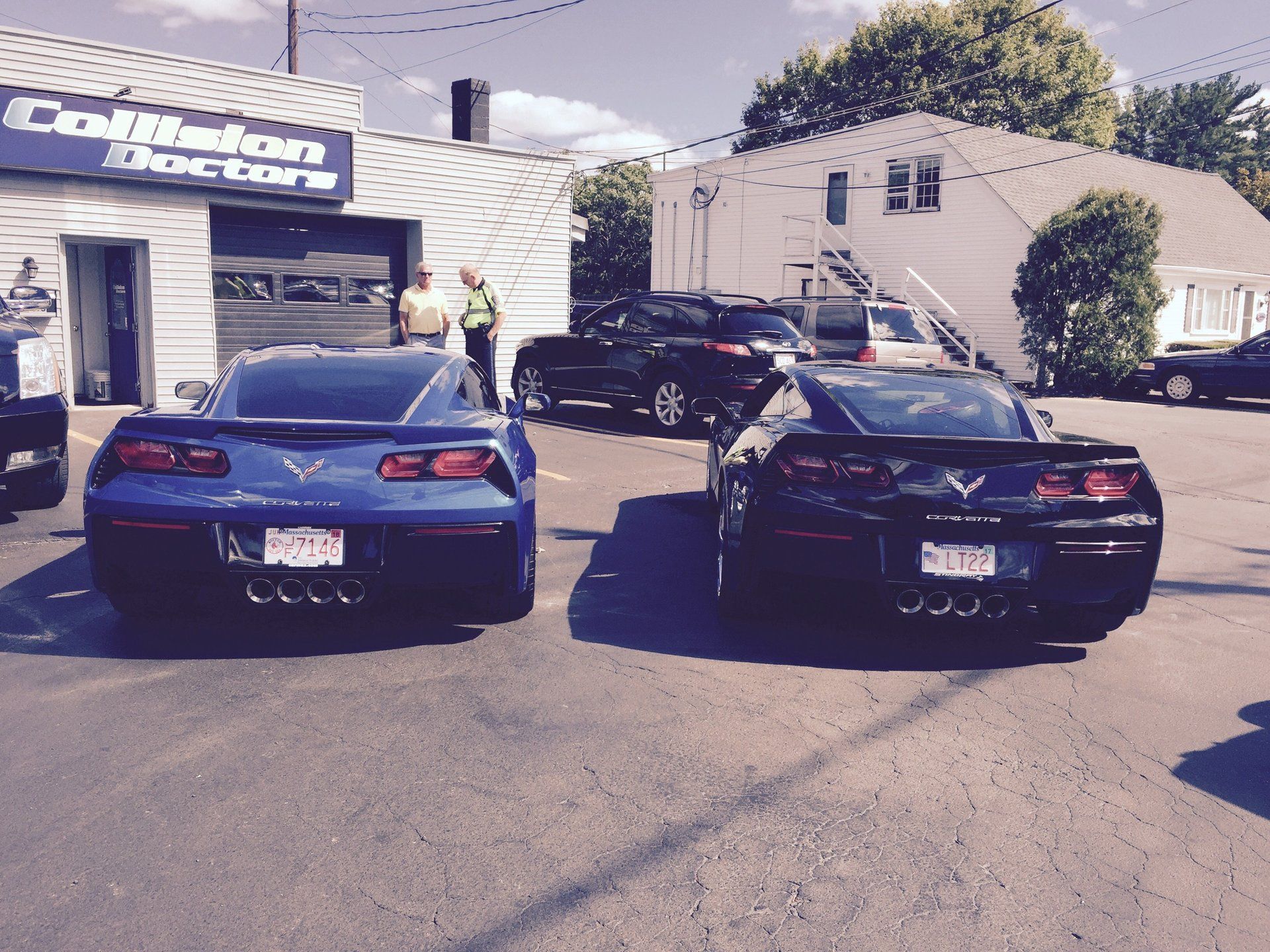 Two cars on repair shop