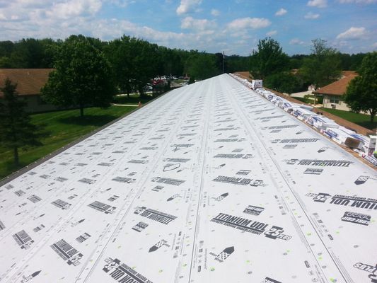 A large white roof with a lot of letters on it