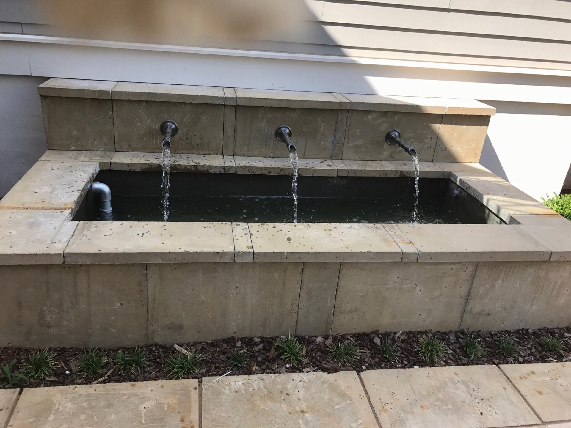 A fountain with water coming out of it