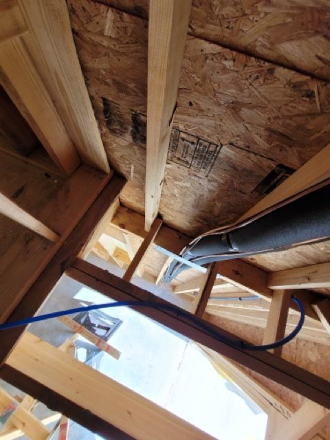 Looking up at the ceiling of a house under construction