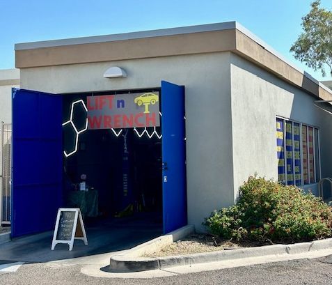 A building with open blue doors.