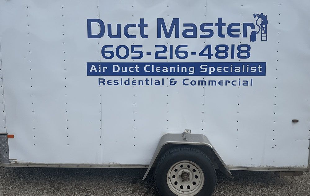 A white trailer with Duct Master written on it