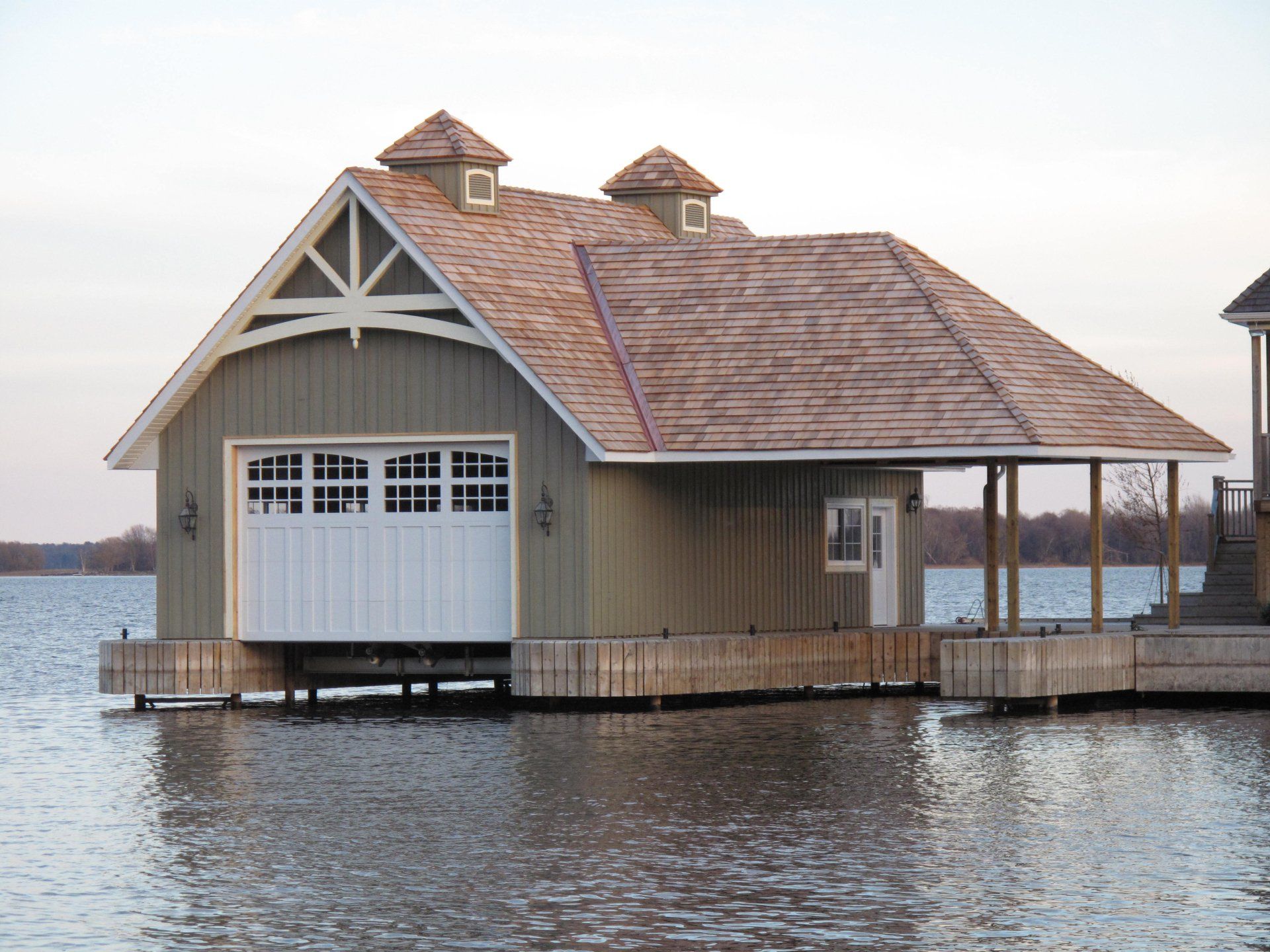 Floating house with garage doors
