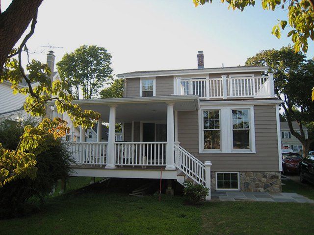 A house with a large porch and stairs