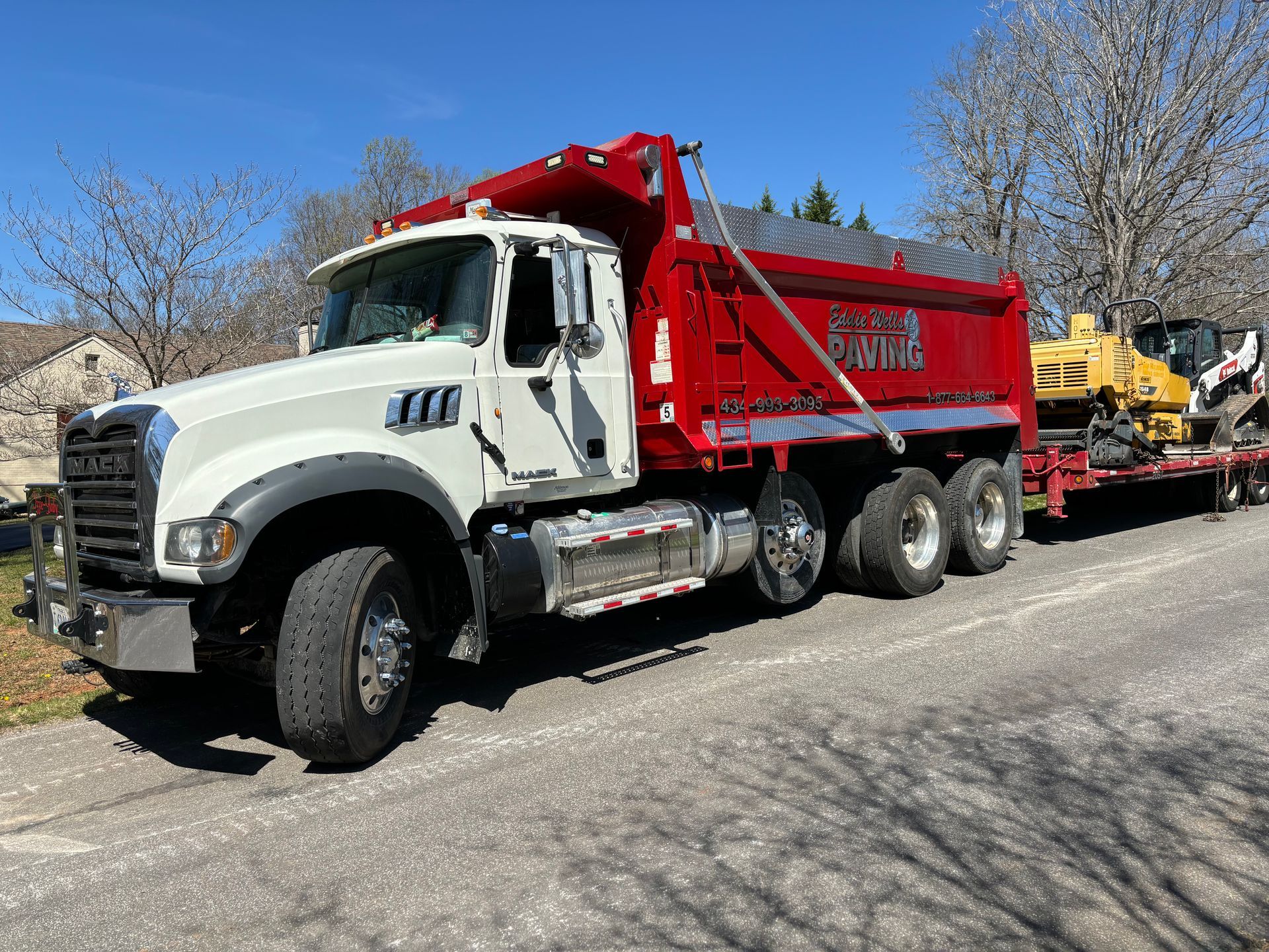 Eddie Wells Paving truck parked along the road