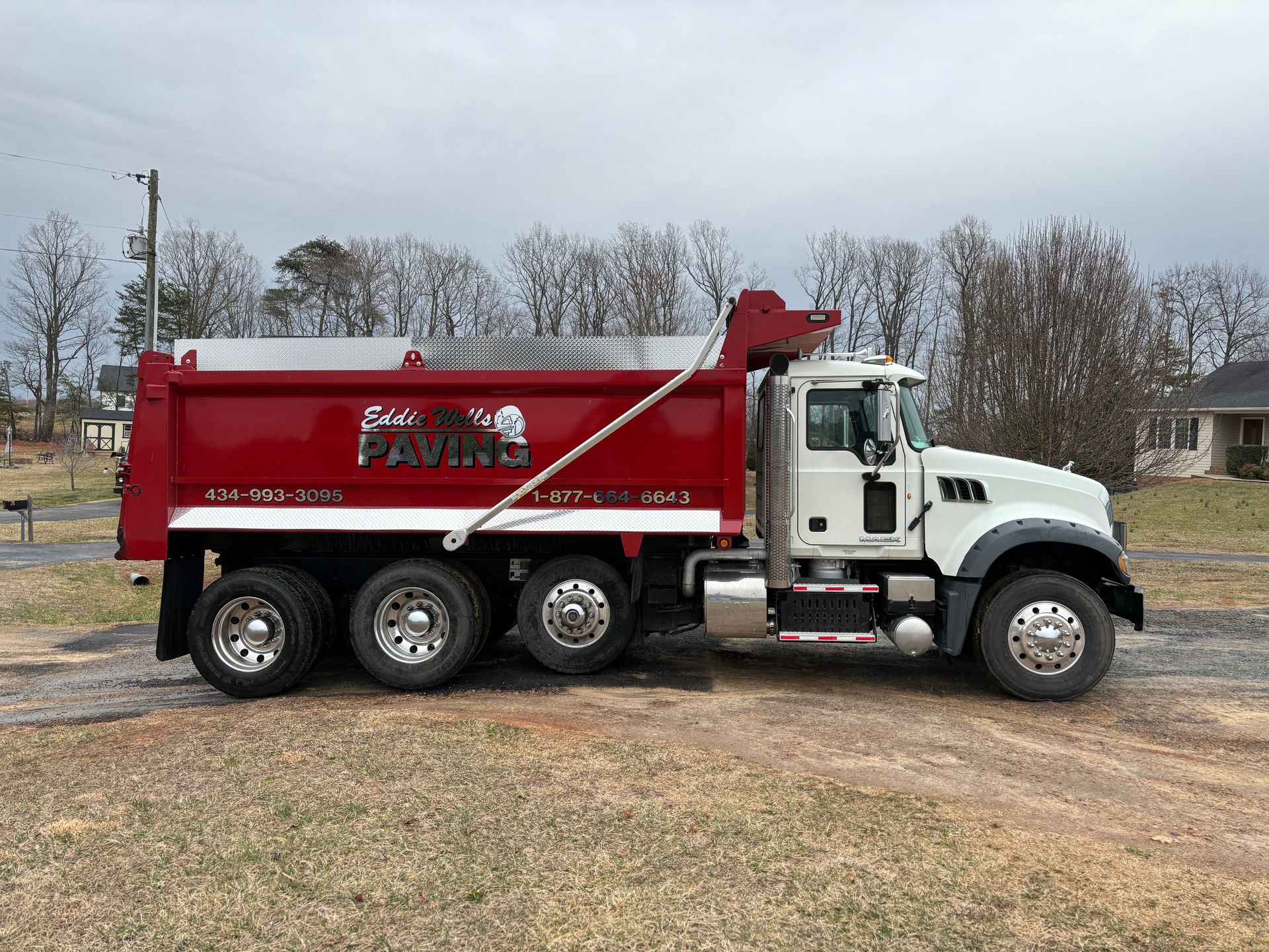 A side shot of a truck for Eddie Wells paving