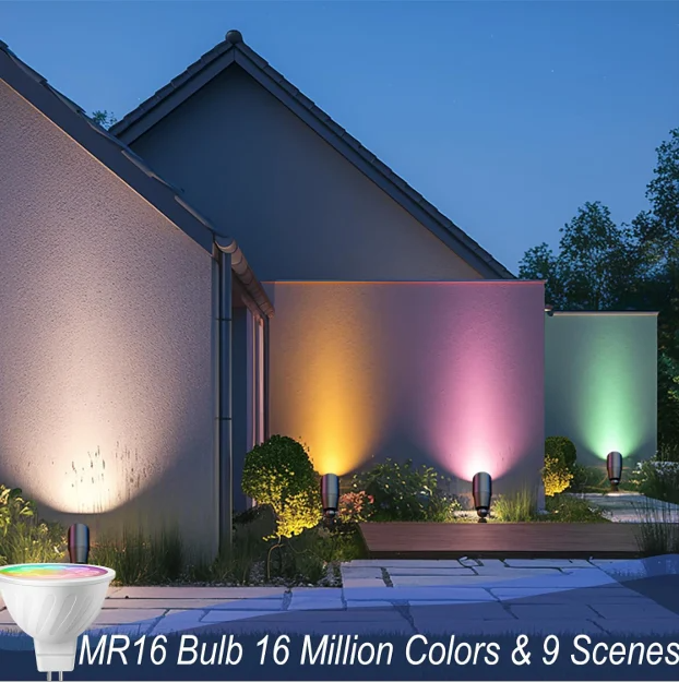 Color-changing outdoor wall lights illuminating a modern house at dusk, with pink, gold, and green glows
