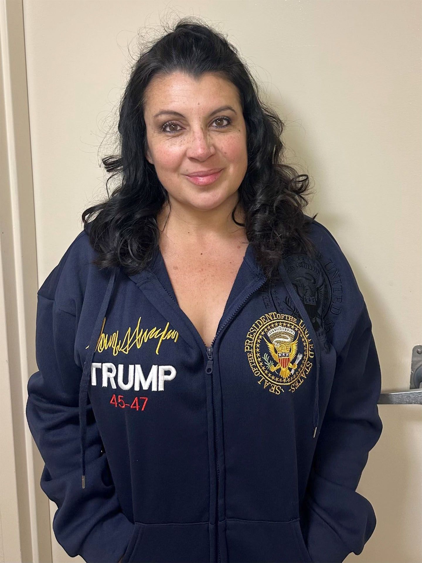 Woman wearing a navy blue sweatshirt