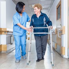 Happy elderly in a walker 