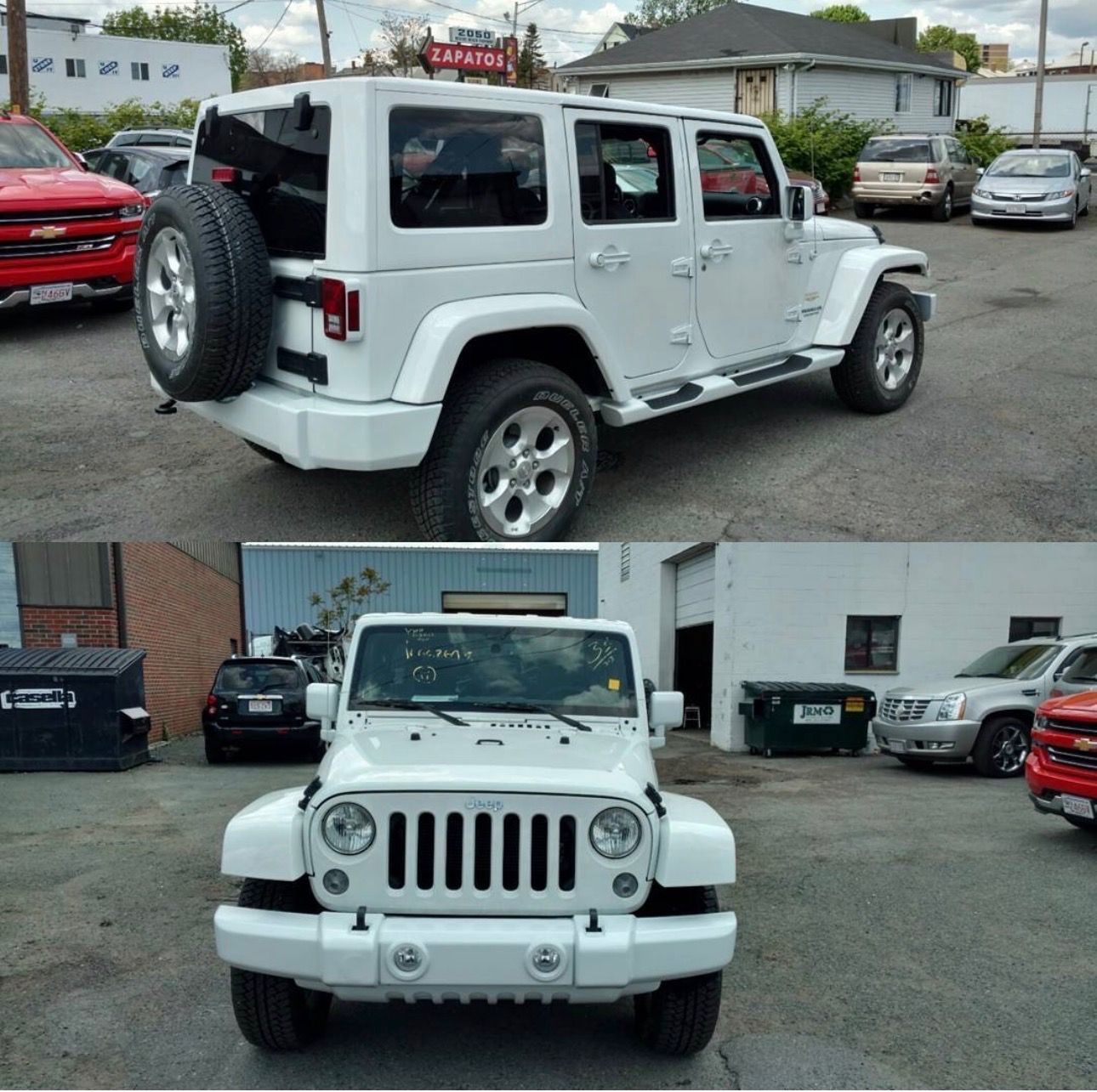 White Jeep Wrangler shown from rear and front at a car dealership lot, with red cars and buildings in the background