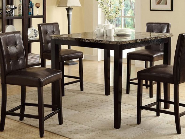square dining table and leather seats
