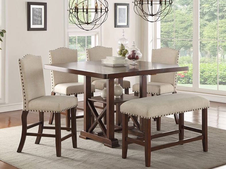 square dining table with upholstered white chairs