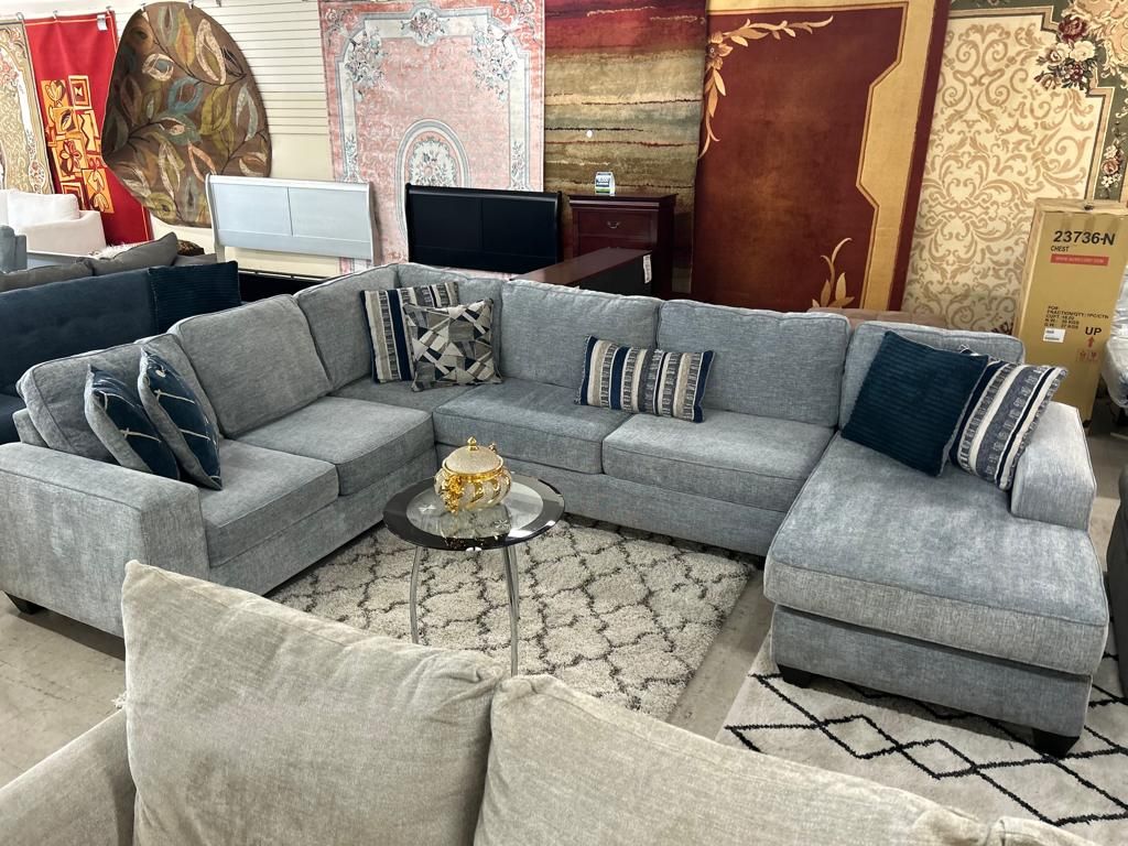 gray sectional with throw pillows