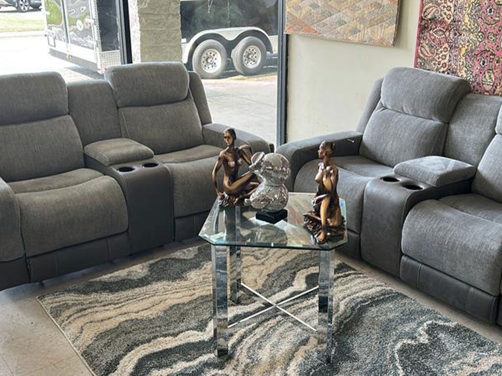 Gray microfiber sofa set and a center table
