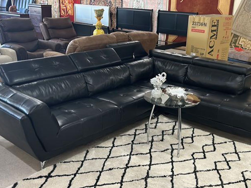 Black leather sofa set with center table