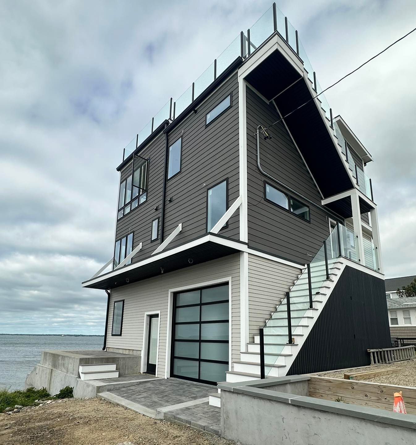 A large house with stairs leading up to it