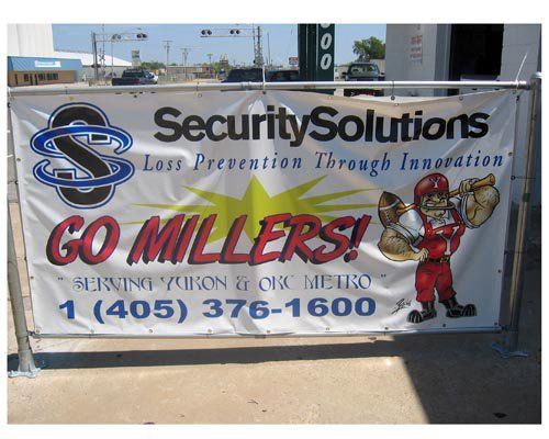 A security solutions sign that says go millers