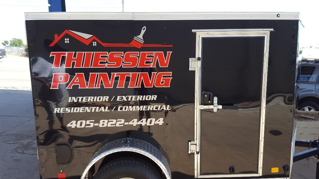 A black trailer with the word painting on it
