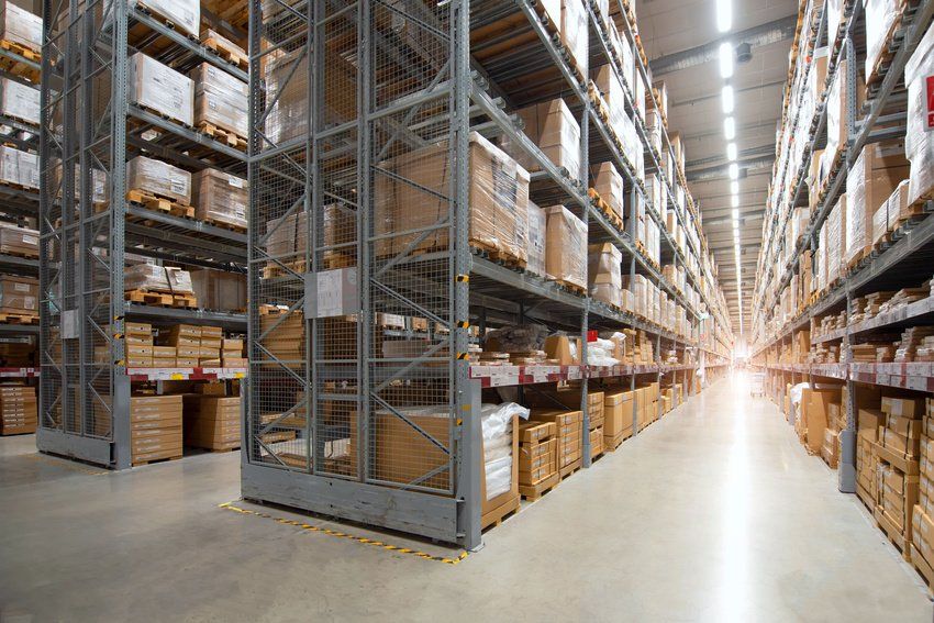 A large warehouse filled with lots of shelves and boxes