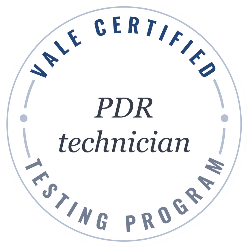 Vale Certified PDR technician badge. White circle with blue text,