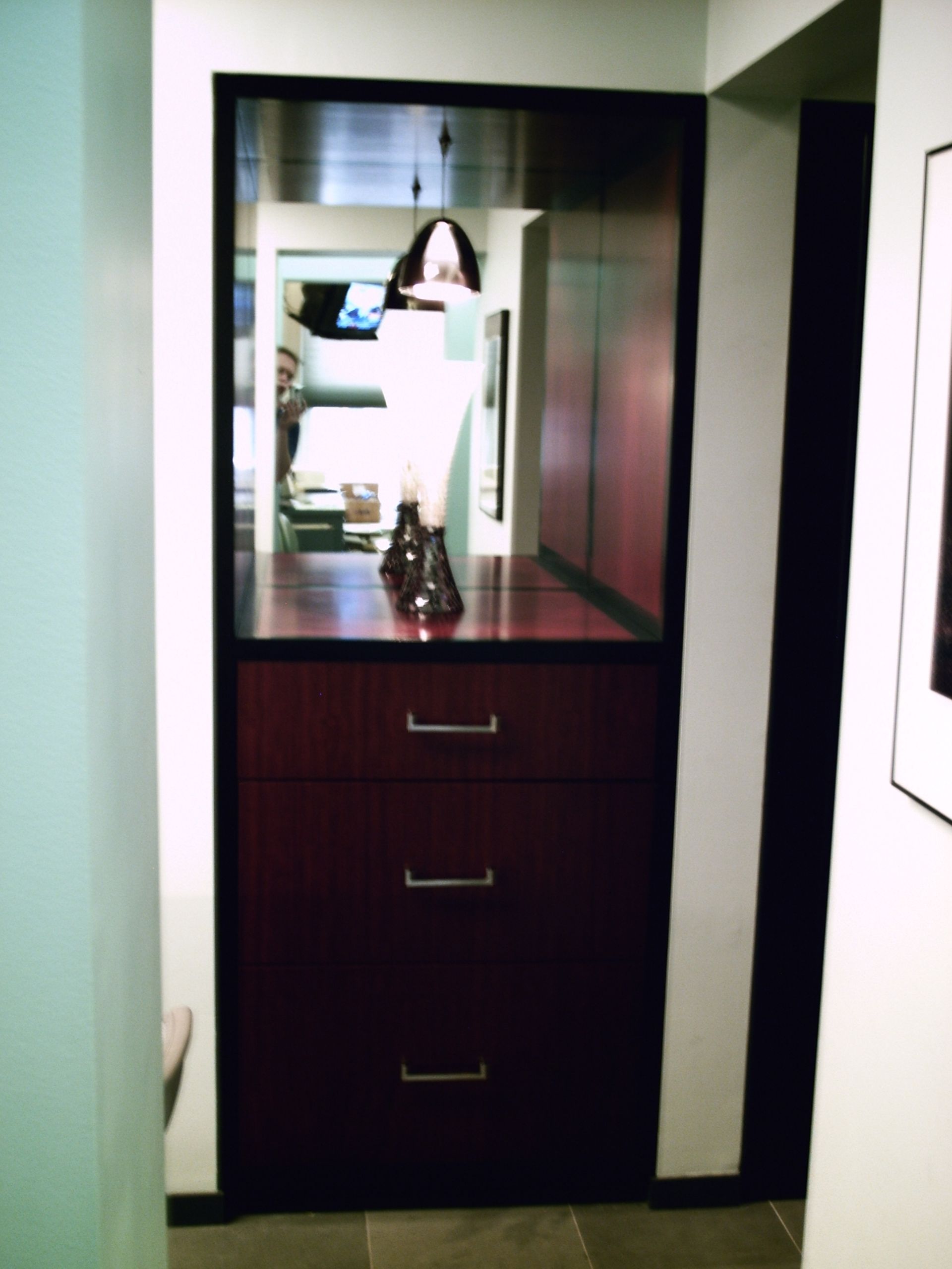 shapiro brown cabinetry with mirror