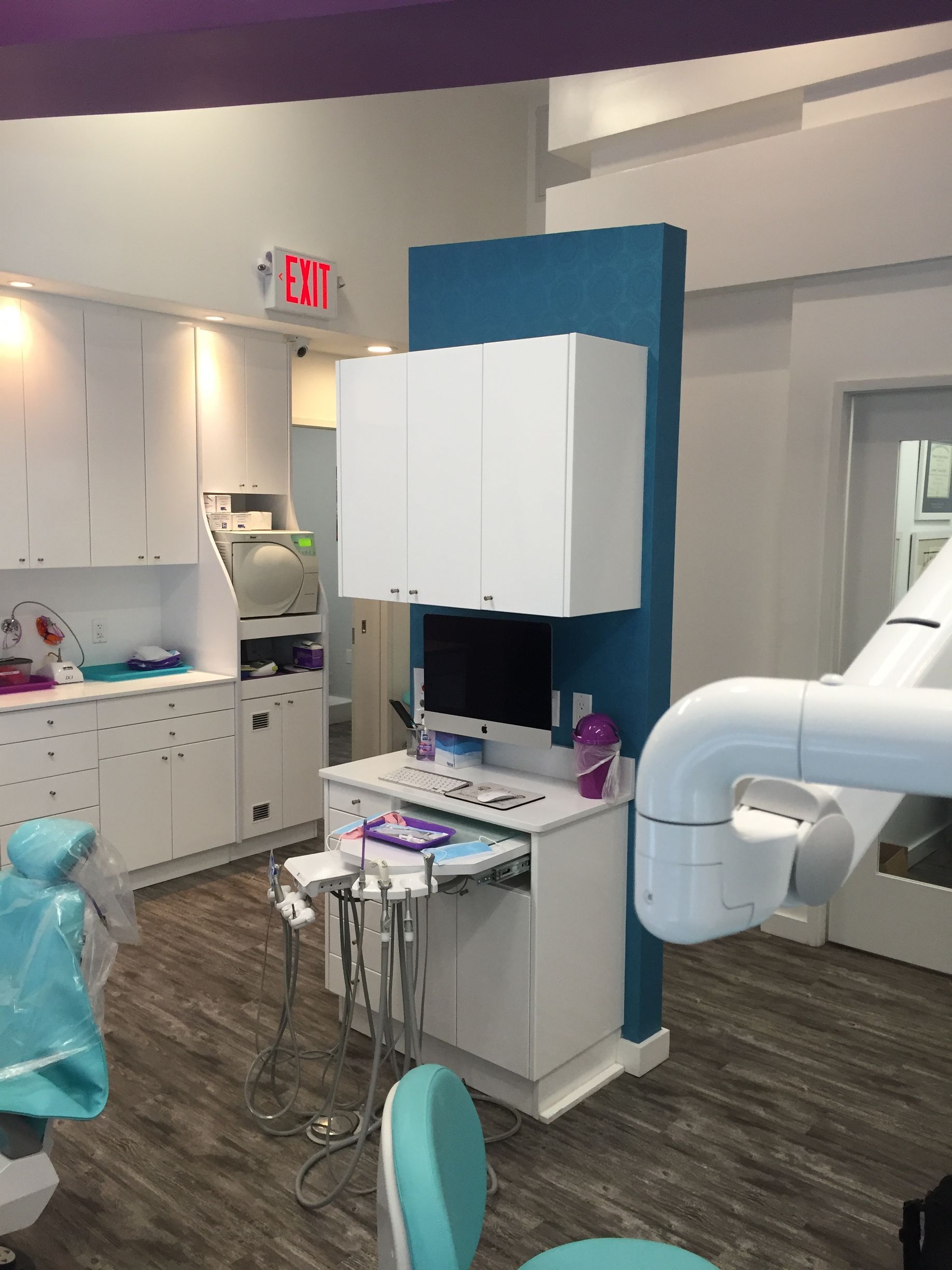 chelsea dental cabinetry holding the computer monitor and dental tools