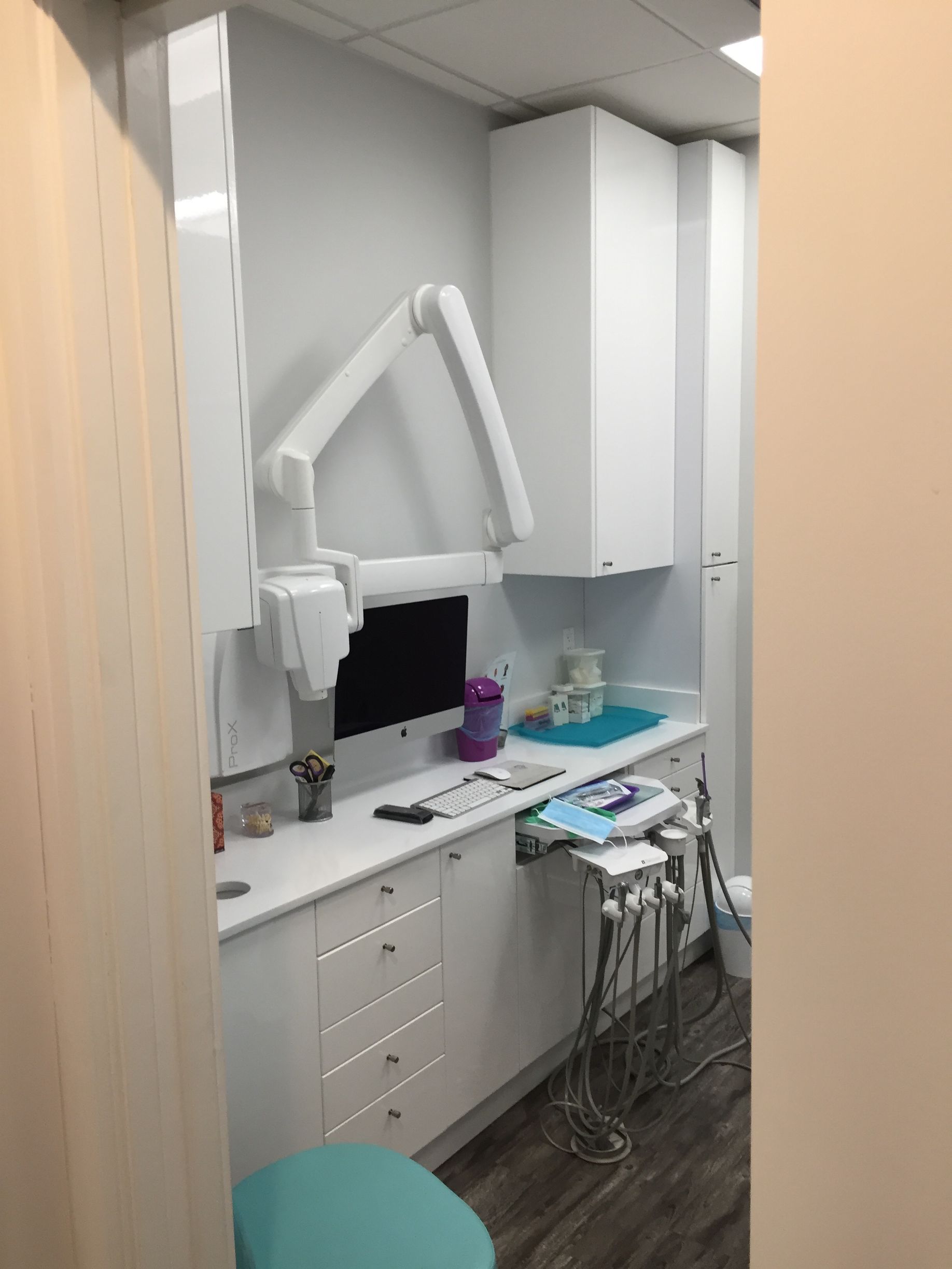 chelsea dental cabinetry with a tool tray