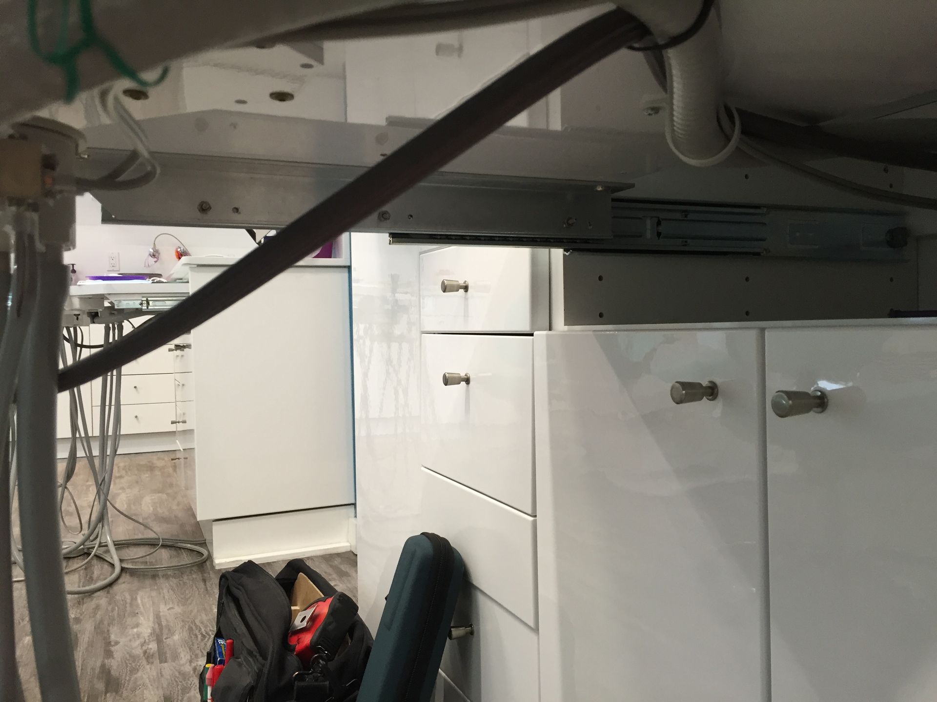 dental tubes tucked under the dental table