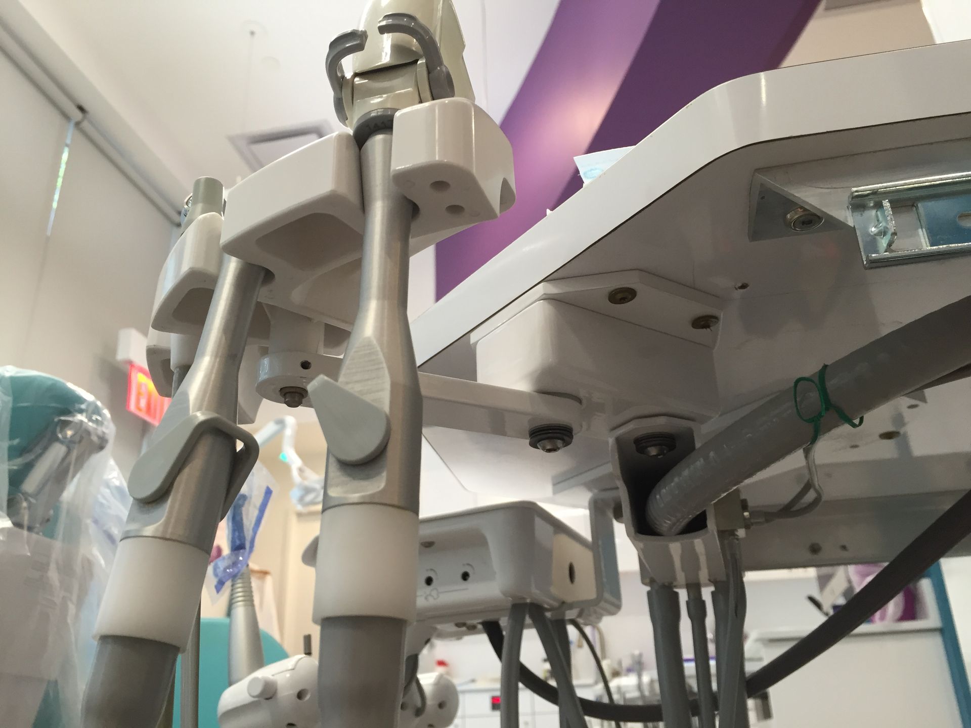 under the dental tray